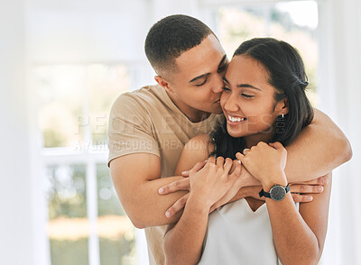 Buy stock photo Couple, hug and kiss in home for love, care and relax for romance, support and trust of bonding together. Happy man hugging young woman, partner and kissing for quality time, happiness or anniversary