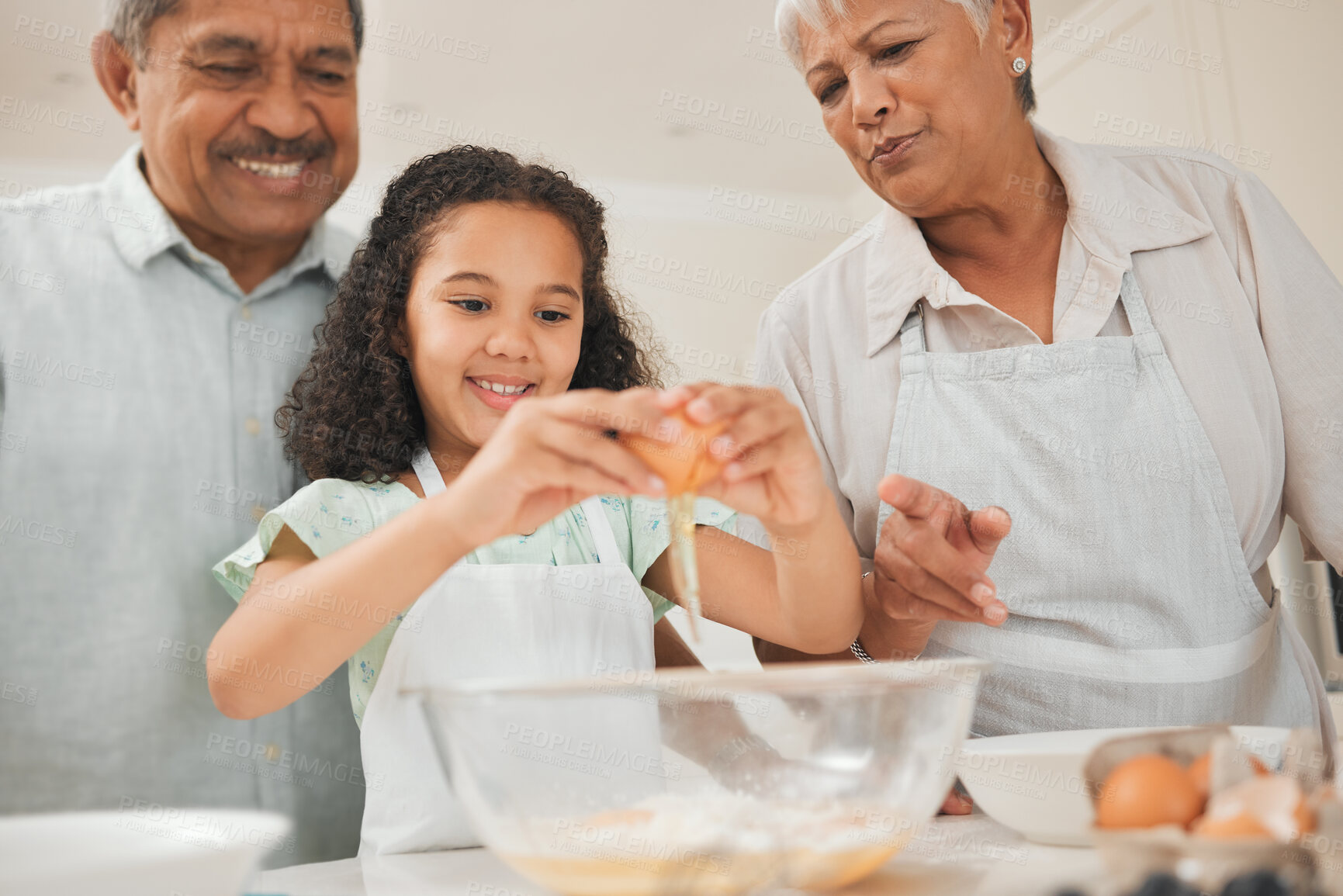 Buy stock photo Egg, child and grandparents with baking in kitchen for helping, learning or teaching cake recipe in home. Family, senior people or girl kid with preparing ingredients for cooking education or support