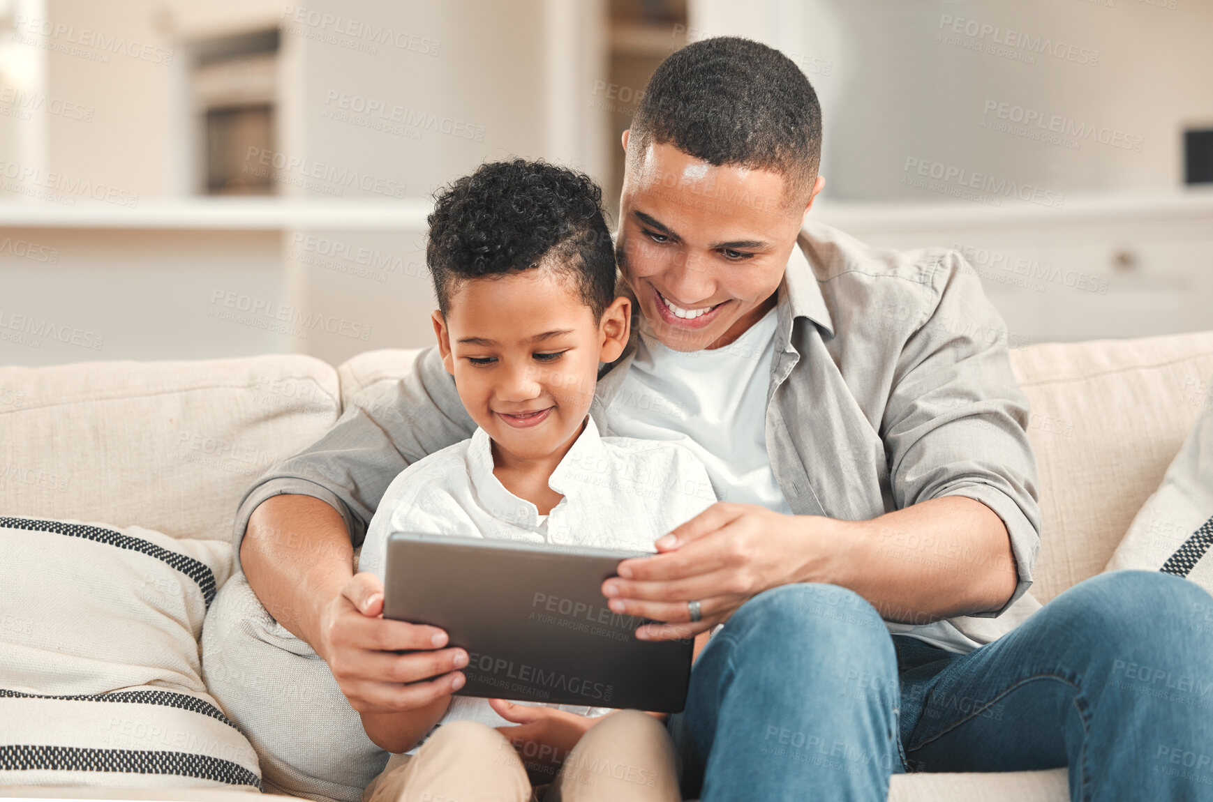 Buy stock photo Dad, boy and happy with tablet in home on sofa on streaming website for educational games. Parent, kid and people with smile in living room for bonding, support and teaching for child development