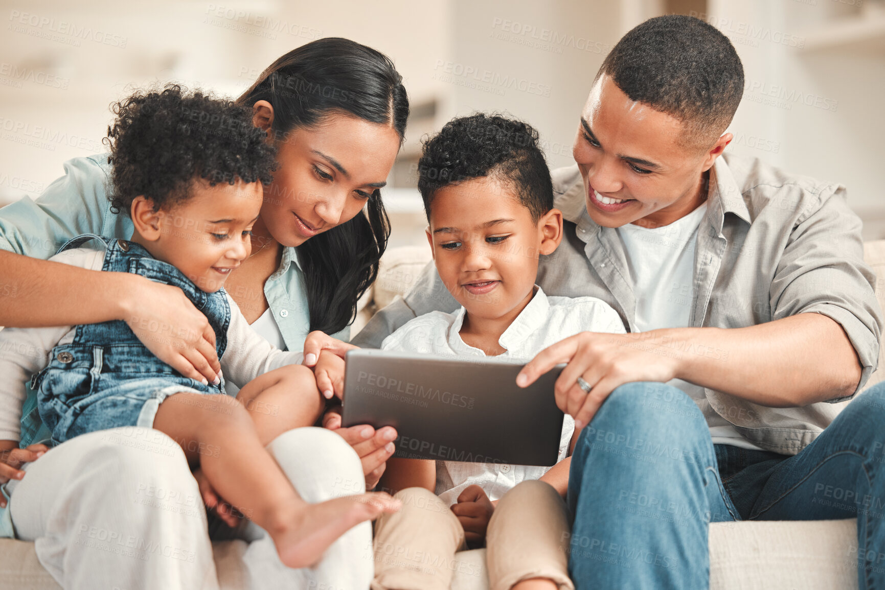 Buy stock photo Parents, boy and happy with tablet in home on sofa on streaming website for educational games. People, family  and kids with smile at lounge for bonding, support and teaching for child development