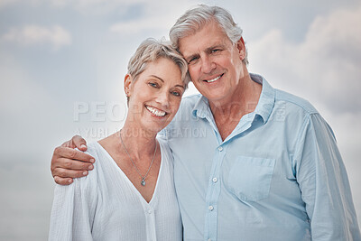 Buy stock photo Portrait, hug and outdoor with senior couple, smile and retirement with happiness, joyful and love. Face, people and man with woman, marriage and relationship with romance, coast and weekend break