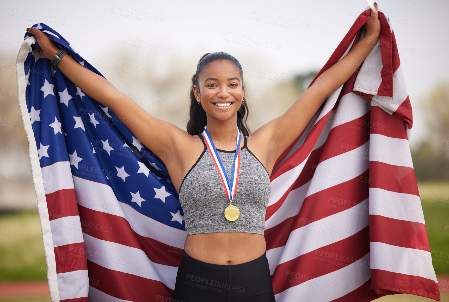 Buy stock photo American woman, flag and athlete with success as celebration for winner, competition and sports achievement outdoor. Female person, portrait and gold medal with running, award and podium performance