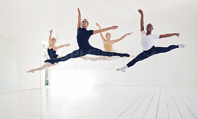 Buy stock photo Shot of a group ballet dancers practicing their routine in a studio