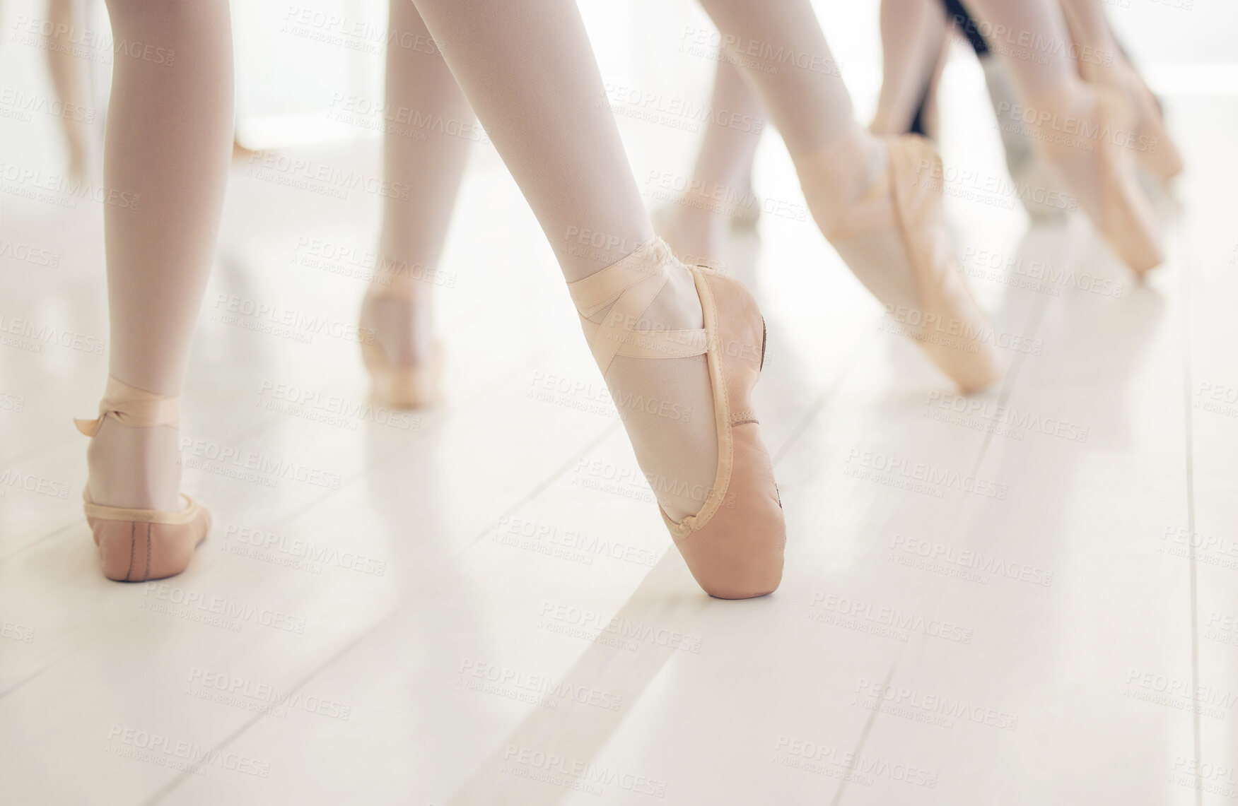 Buy stock photo Ballet, feet and students in row together for practice, exercise or start at professional academy. Art, dance studio and talent with shoes of ballerina people in pointe for creative performance class