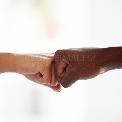 Buy stock photo Diversity, fist bump and hands of people in support of power,  solidarity and collaboration against white background. Hands, connection and men friends in partnership with trust, teamwork or equality