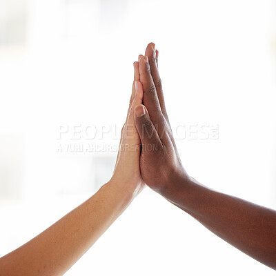 Buy stock photo Shot of an unrecognisable man and woman joining hands a light background
