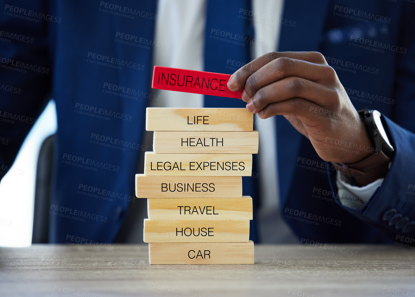 Buy stock photo Hands, insurance and agent with blocks for safety, healthcare or car protection. Business security, wood and person with assurance words closeup for legal expenses, travel or life cover on desk