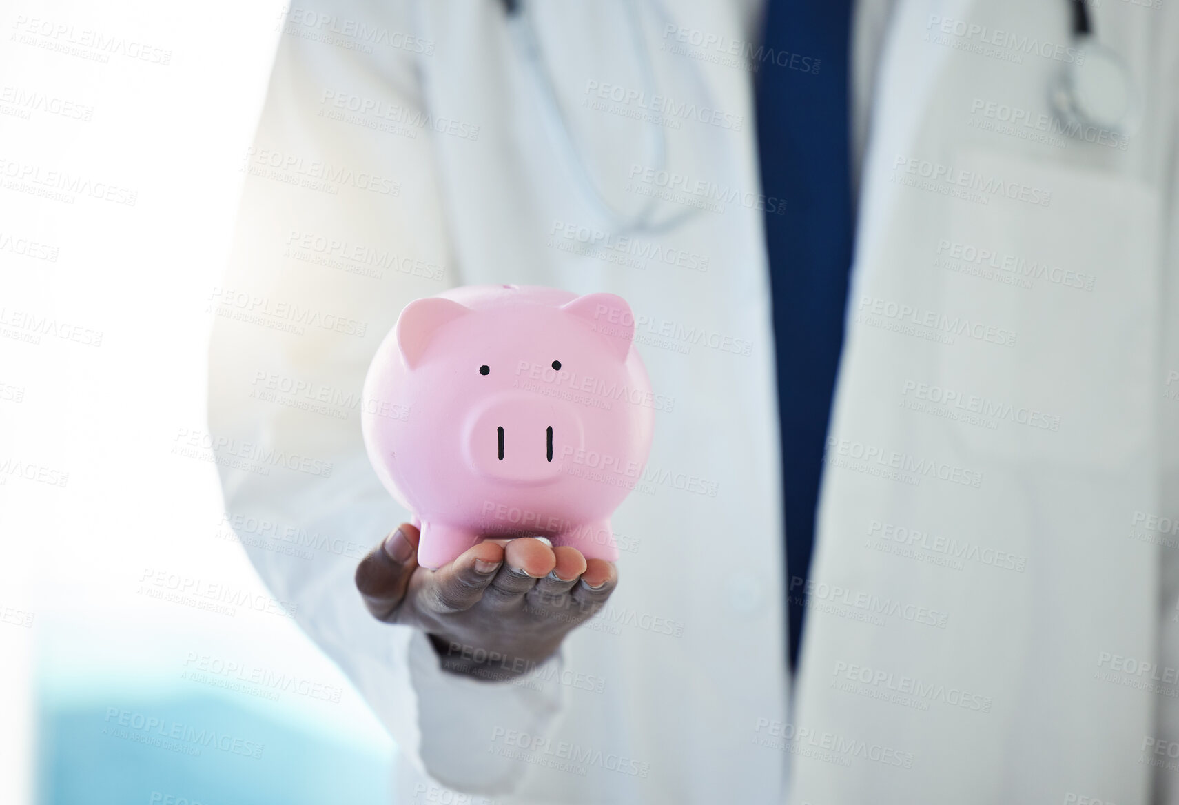 Buy stock photo Hand, healthcare and piggy bank for insurance with doctor in hospital for medical savings closeup. Finance, future and security with medicine professional in clinic for account, budget or payment