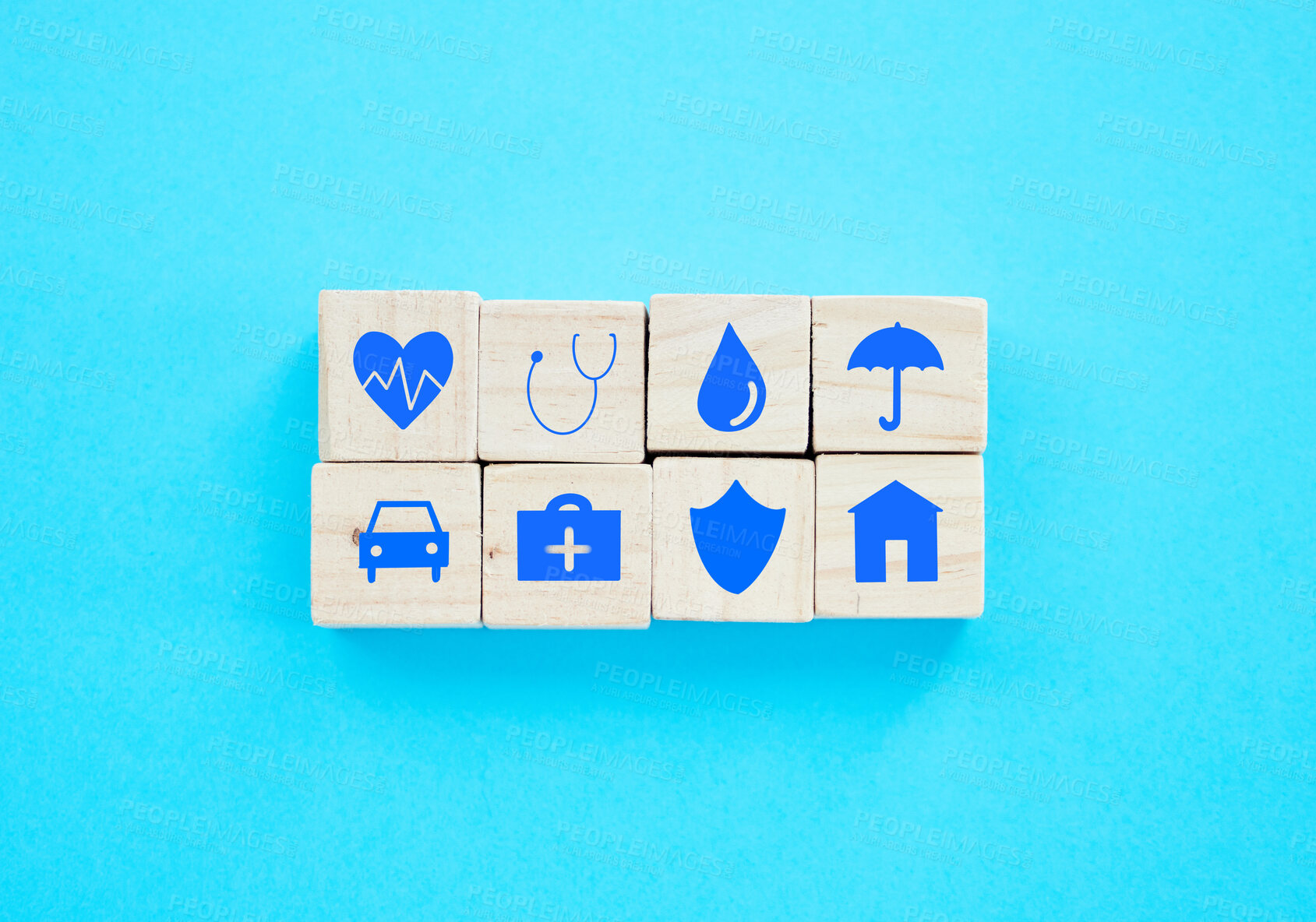 Buy stock photo Insurance, building blocks and security by background with icon for assets, health and car in studio. Puzzle, umbrella and wood toys with house, protection and risk cover for real estate at company