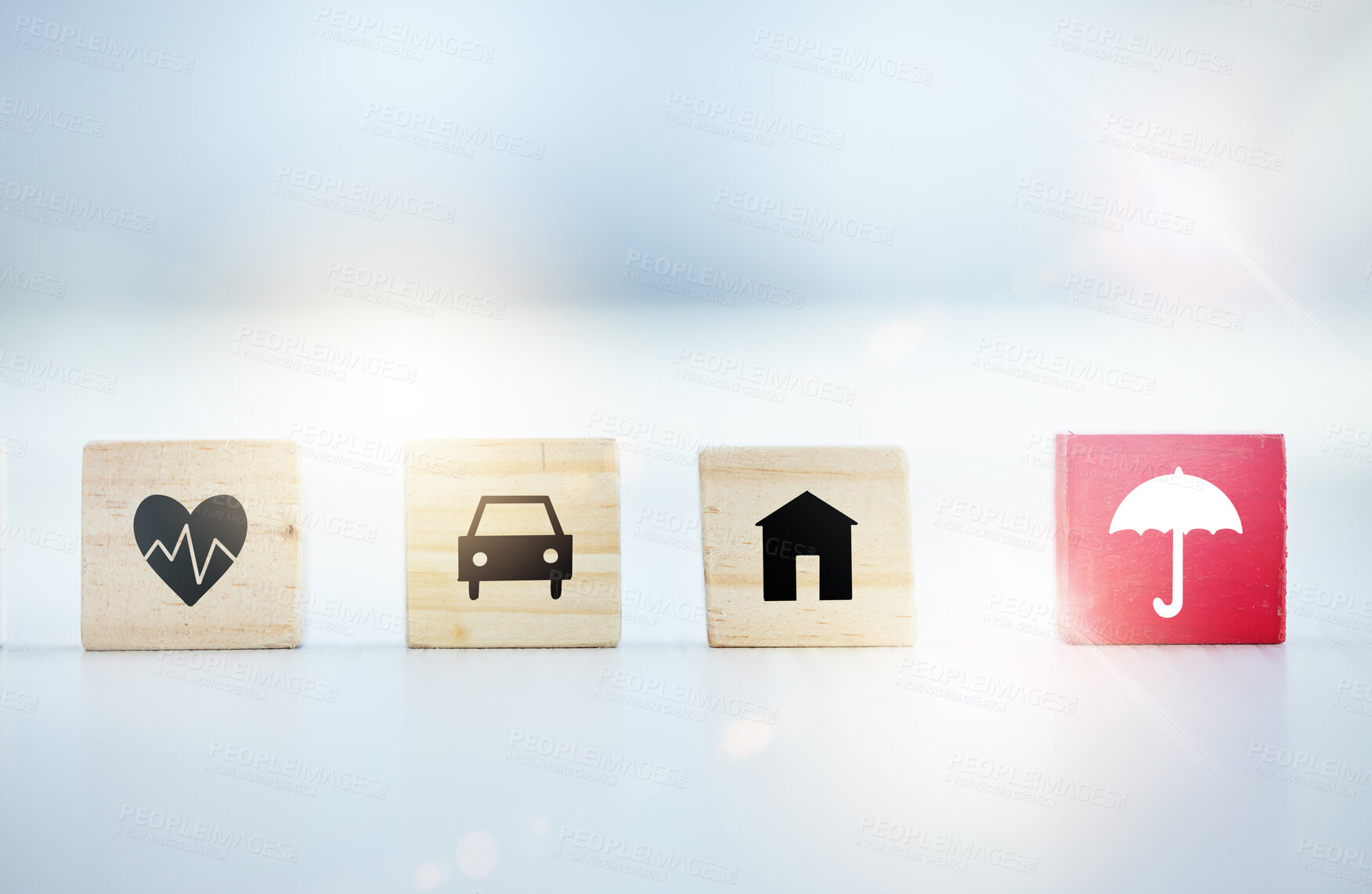 Buy stock photo Shot of wooden blocks with insurance related symbols on them