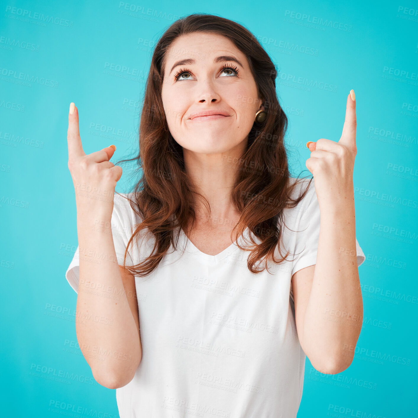 Buy stock photo Happy woman, studio and pointing up for ads, presentation or show information. Sales, offer and model with hand gesture for promo, discount deal or marketing announcement isolated on blue background