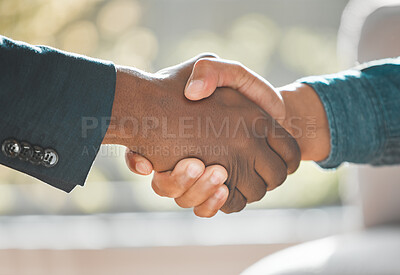 Buy stock photo Shot of two businessmen shaking hands in agreement