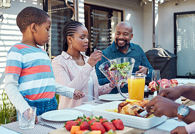 Buy stock photo Black family, lunch and people with food by home for conversation, eating and relax together at reunion. African woman, happy and love at table in backyard for meal, nutrition and bonding on weekend