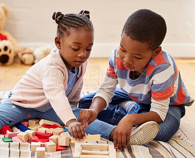 Buy stock photo Shot of two siblings playing in their room at home