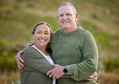 Buy stock photo Shot of a mature couple spending the day outdoors