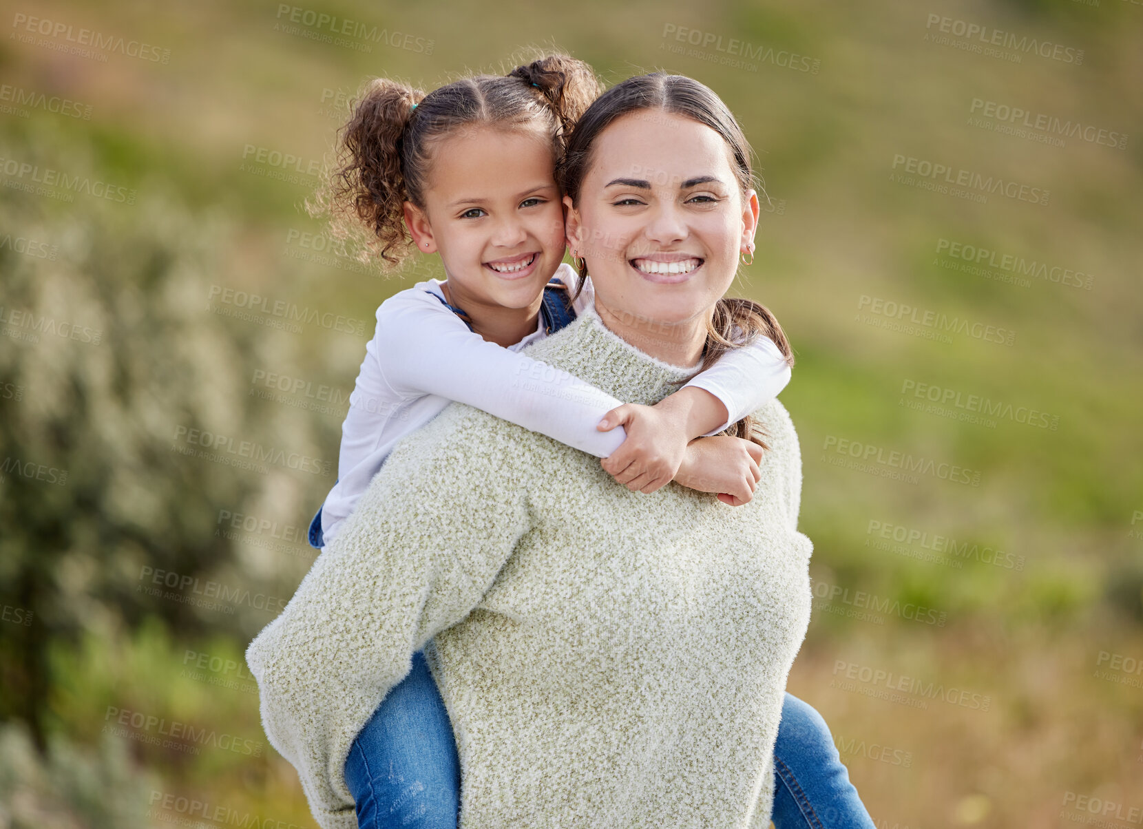 Buy stock photo Shot of a woman spending time outdoors with her daughter