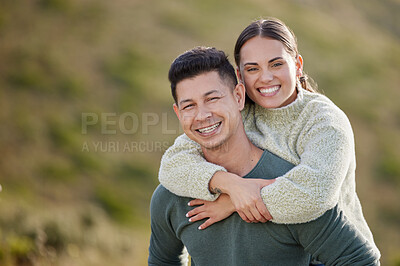 Buy stock photo Shot of a young couple spending the day outdoors