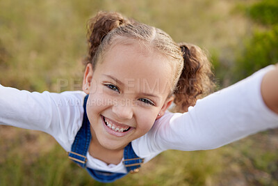 Buy stock photo Shot of an adorable little girl having fun outdoors