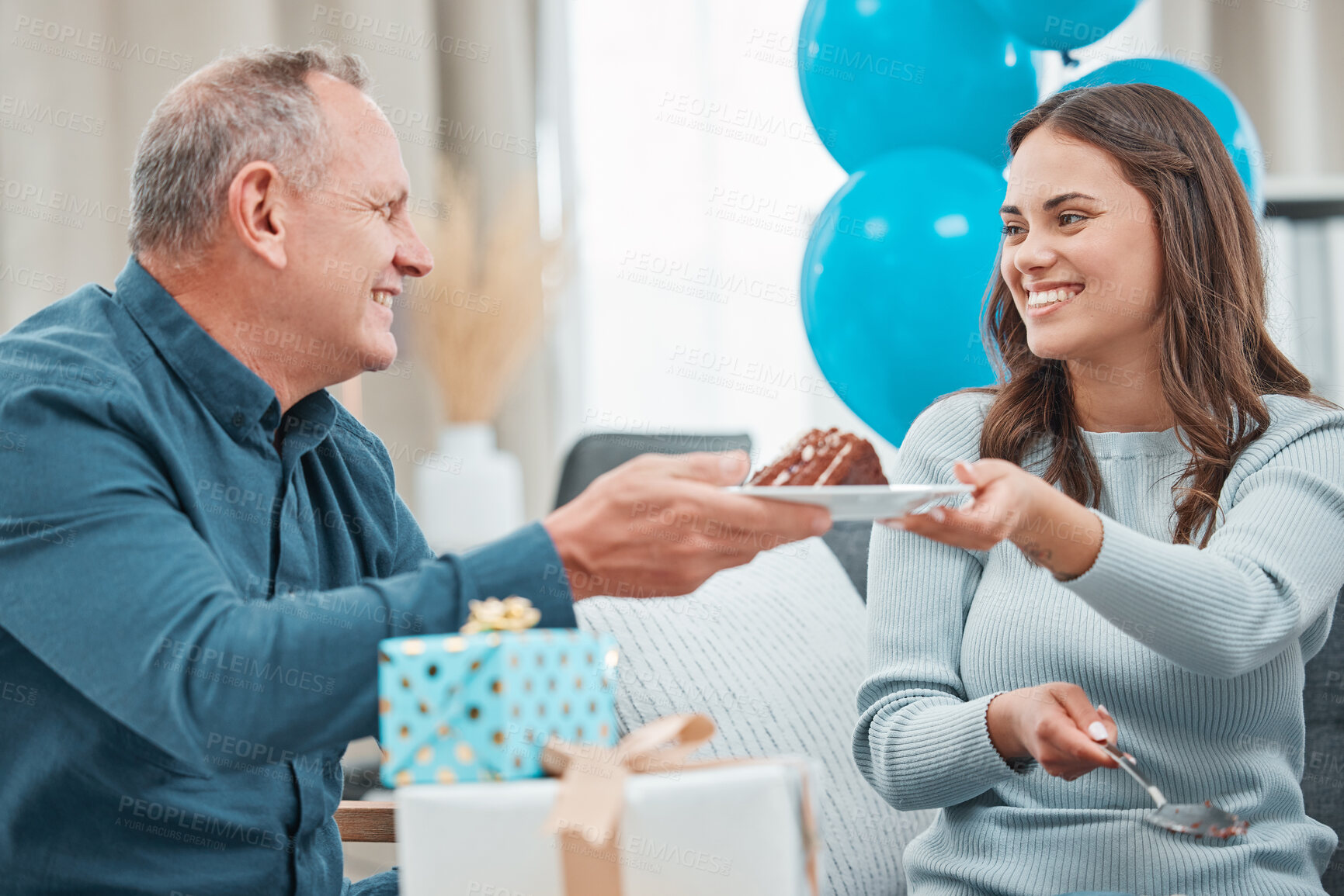 Buy stock photo Shot of a happy family celebrating a birthday at home