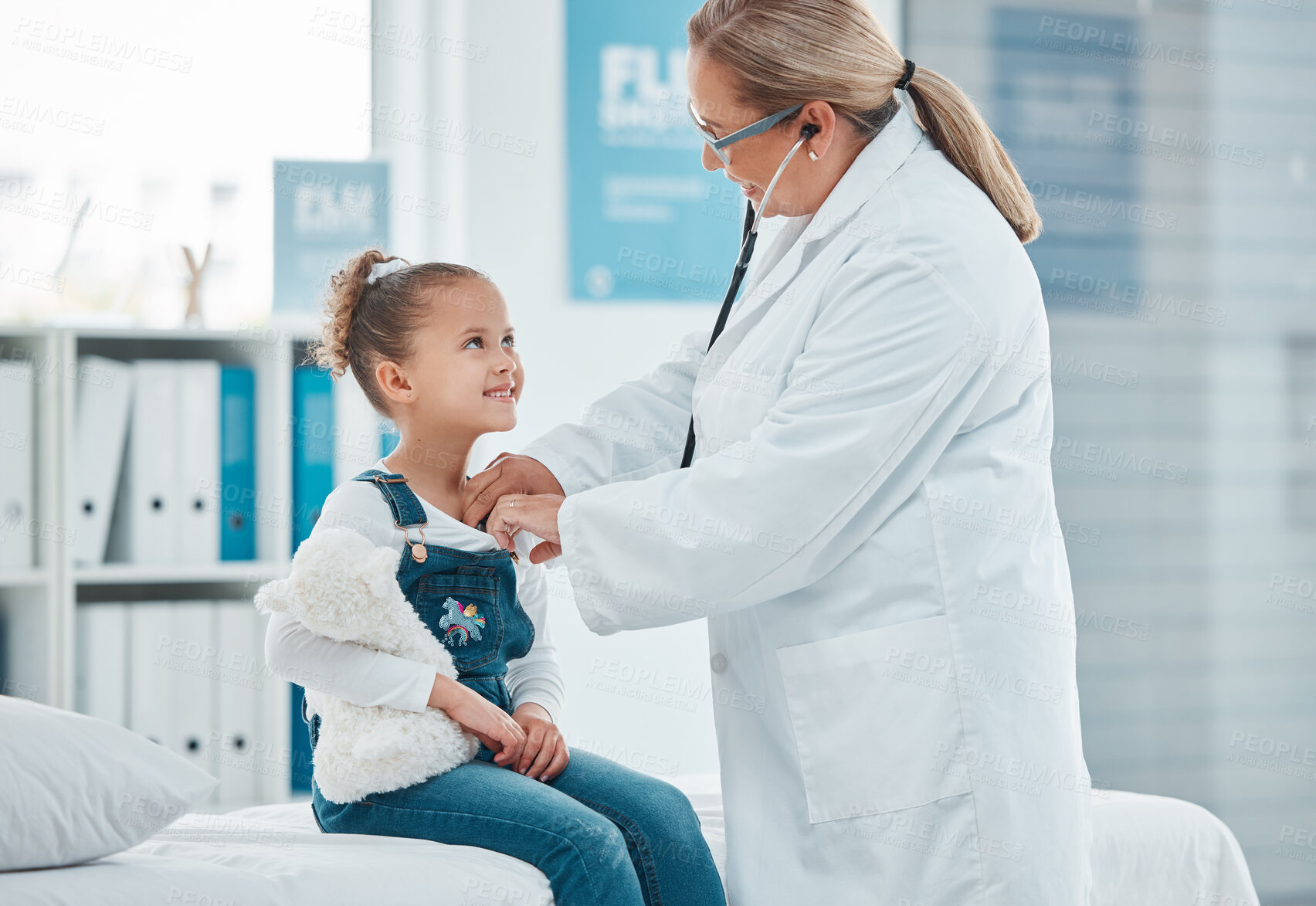 Buy stock photo Health wellness, doctor exam with child patient and consultation with stethoscope at a clinic. Cardiology or healthcare, medicine and surgeon medical test with a female kid in a hospital building