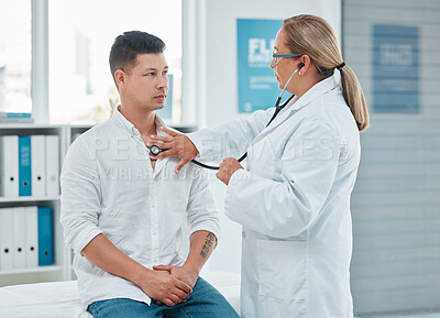 Buy stock photo Healthcare, doctor test with man patient and consultation with stethoscope at a hospital room. Cardiology or health wellness, medicine and surgeon medical exam with a male person in a clinic building
