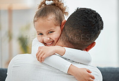 Buy stock photo Shot of a little girl being held by her father