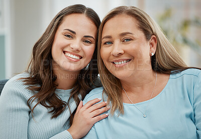 Buy stock photo Shot of a young woman spending time with her mother