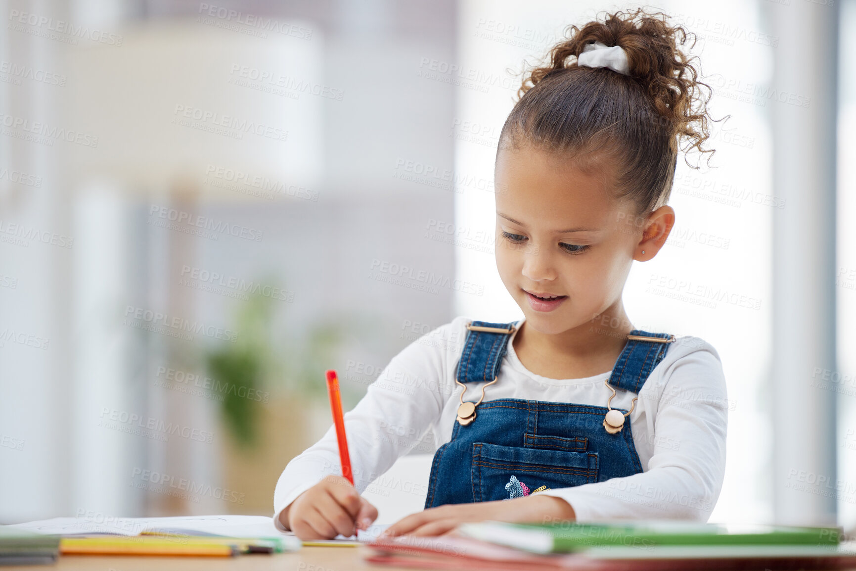 Buy stock photo Young girl, writing and homework with book for learning, education or drawing project at home. Child, kid or kindergarden student with smile for coloring activity, assignment or assessment at house