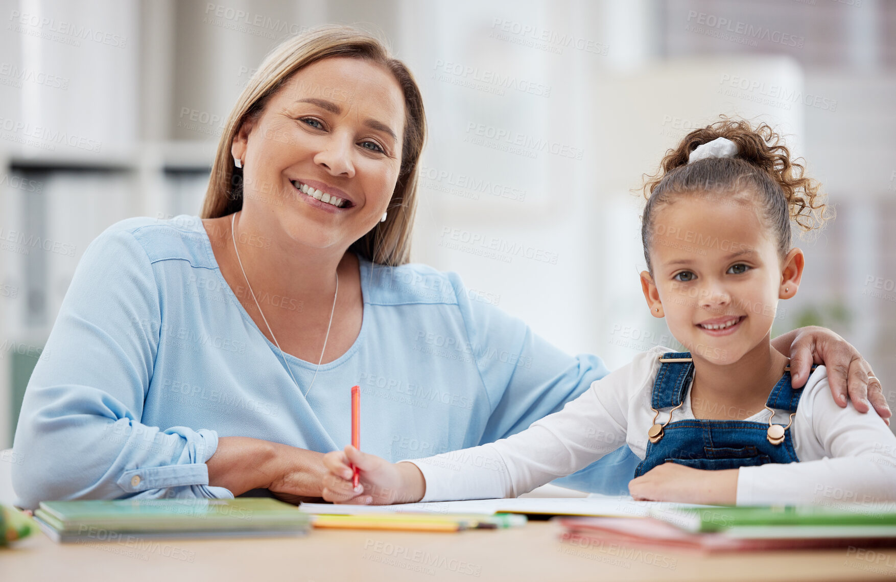 Buy stock photo Woman, child and portrait in home for education, trust or helping with homework. Tutor, girl or encourage in living room for learning, creativity or development with positive reinforcement for growth