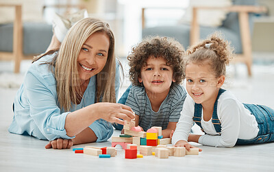 Buy stock photo Shot of a grandmother playing with her grand children