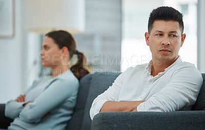Buy stock photo Shot of a young couple in the midst of an argument
