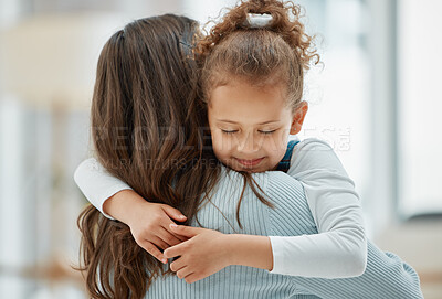 Buy stock photo Shot of a mother carrying her daughter