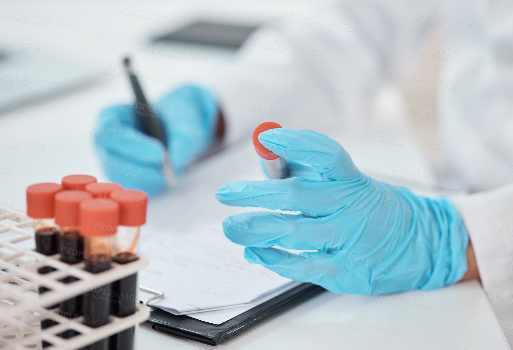 Buy stock photo DNA, hands and science with doctor in laboratory for breakthrough, discovery or research. Blood, sample and writing with person at desk for clinical trial, experiment or innovation in pharmaceuticals