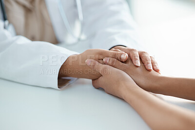 Buy stock photo Cropped shot of an unrecognisable doctor sitting and comforting her patient in her clinic during a consultation