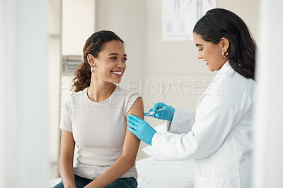 Buy stock photo Injection, vaccine and patient at the clinic for consulting and help with prevention with a smile. Doctor, inject and woman on arm for virus with gloves in medical room for wellness or health.