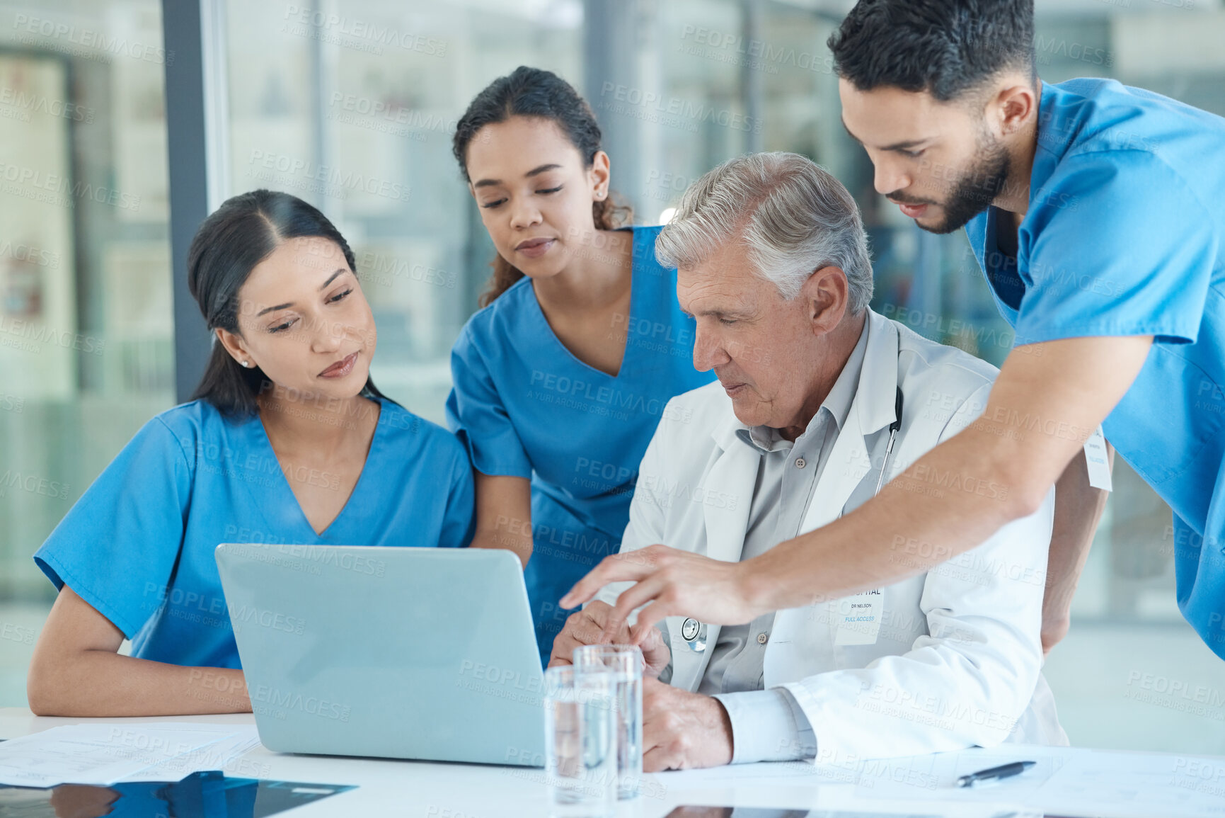 Buy stock photo Medical group, discussion and people on laptop in meeting for learning healthcare, brainstorming or training. Doctor, nurses or team on computer for conversation, planning and help mentor in hospital