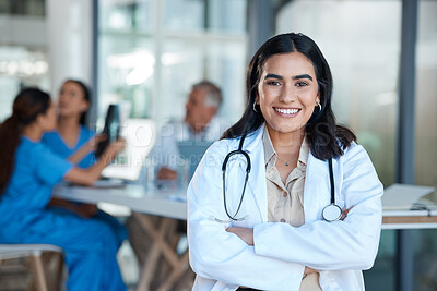 Buy stock photo Shot of a young female doctor during a meeting