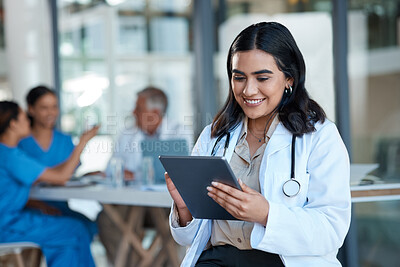 Buy stock photo Hospital, doctor and Indian woman on tablet for medical analysis, research and report in meeting. Healthcare, clinic and female nurse on digital tech for wellness app, online consulting and service