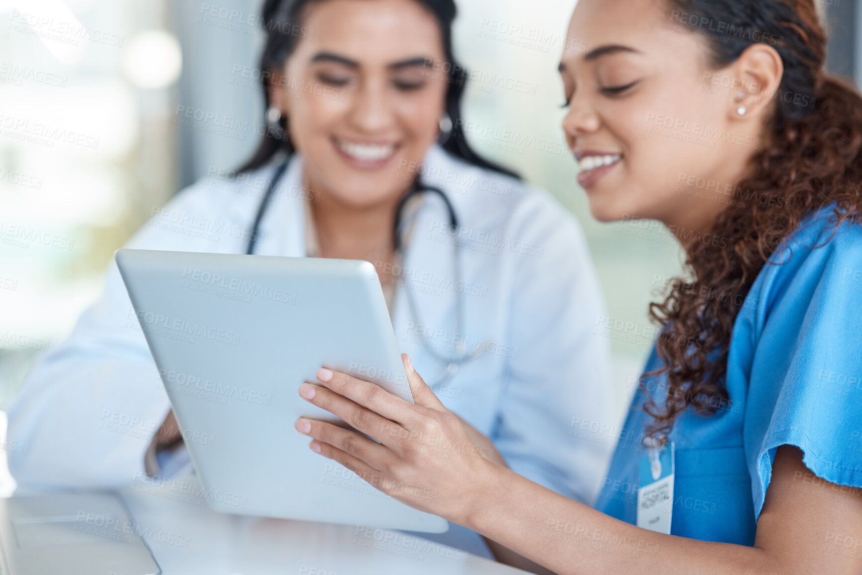 Buy stock photo Hospital, doctors and women in discussion on tablet for medical analysis, research and internet. Healthcare, clinic and female health workers talking on digital tech for advice, consulting or service