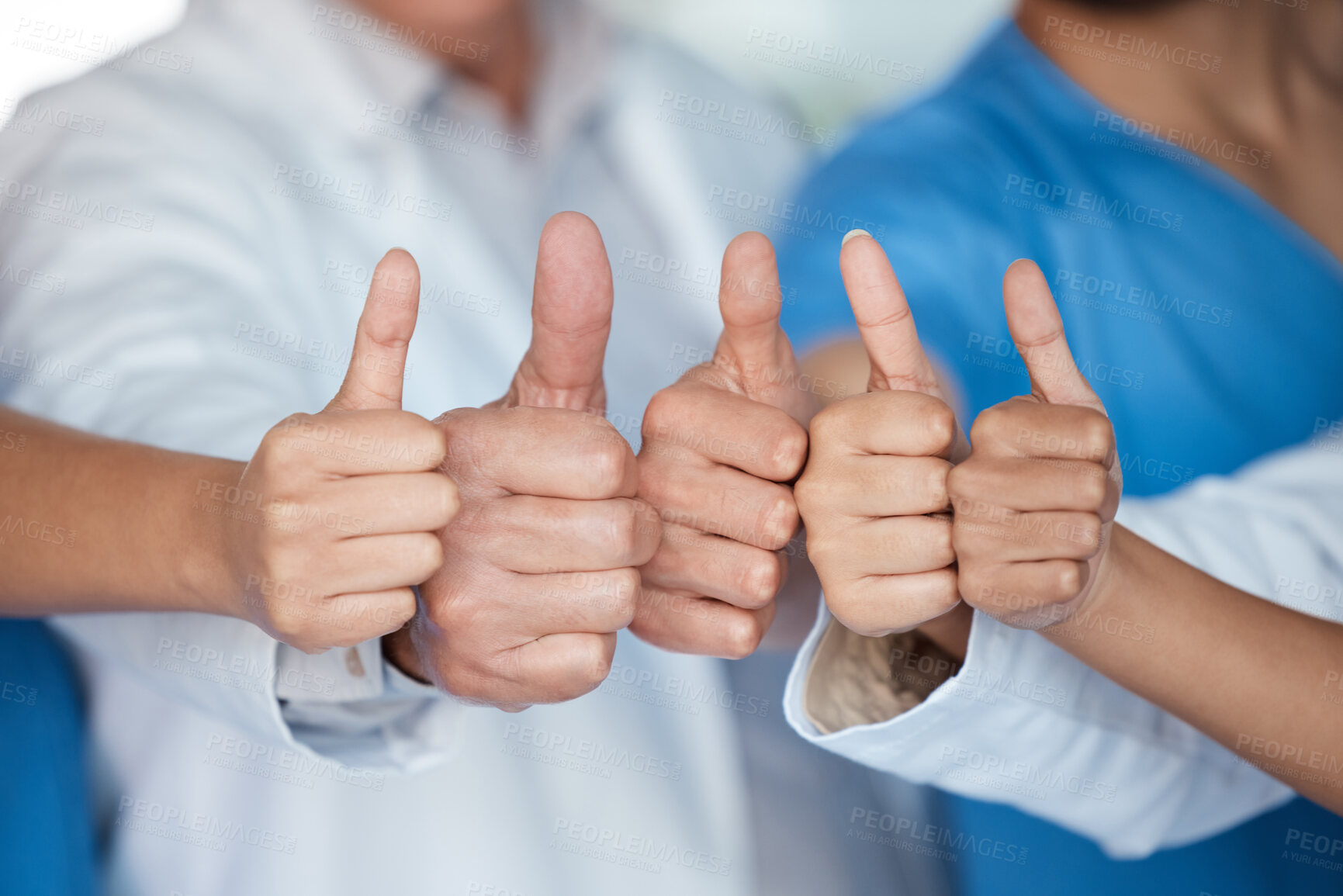 Buy stock photo Hospital, team and hands of people with thumbs up for medical service, feedback and agreement. Doctor, nurse and group with gesture of support at clinic for healthcare review, solidarity and approval