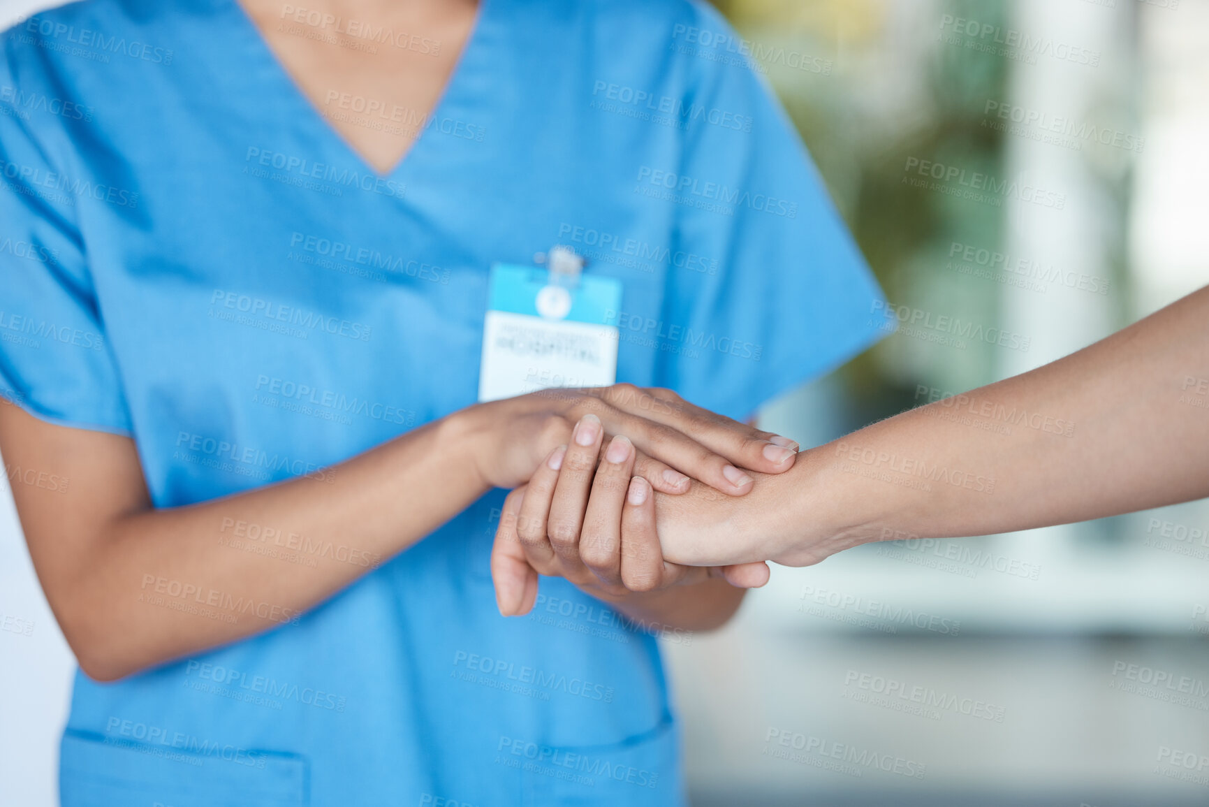 Buy stock photo Hospital, holding hands and nurse with patient for comfort, empathy and support for diagnosis or results. Healthcare, clinic and health worker with person for medical wellness, service and help