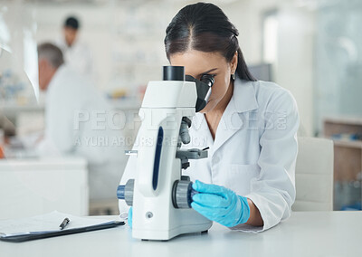 Buy stock photo Scientist, woman and microscope with research and medical analysis in clinic laboratory. Chemistry, testing and hospital doctor with monkeypox vaccine and science work with ppe gear for virus study