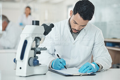 Buy stock photo Scientist, man and writing with checklist in lab for study, stats and results with microscope for research. Person, clipboard and documents for pharmaceutical innovation with medicine development