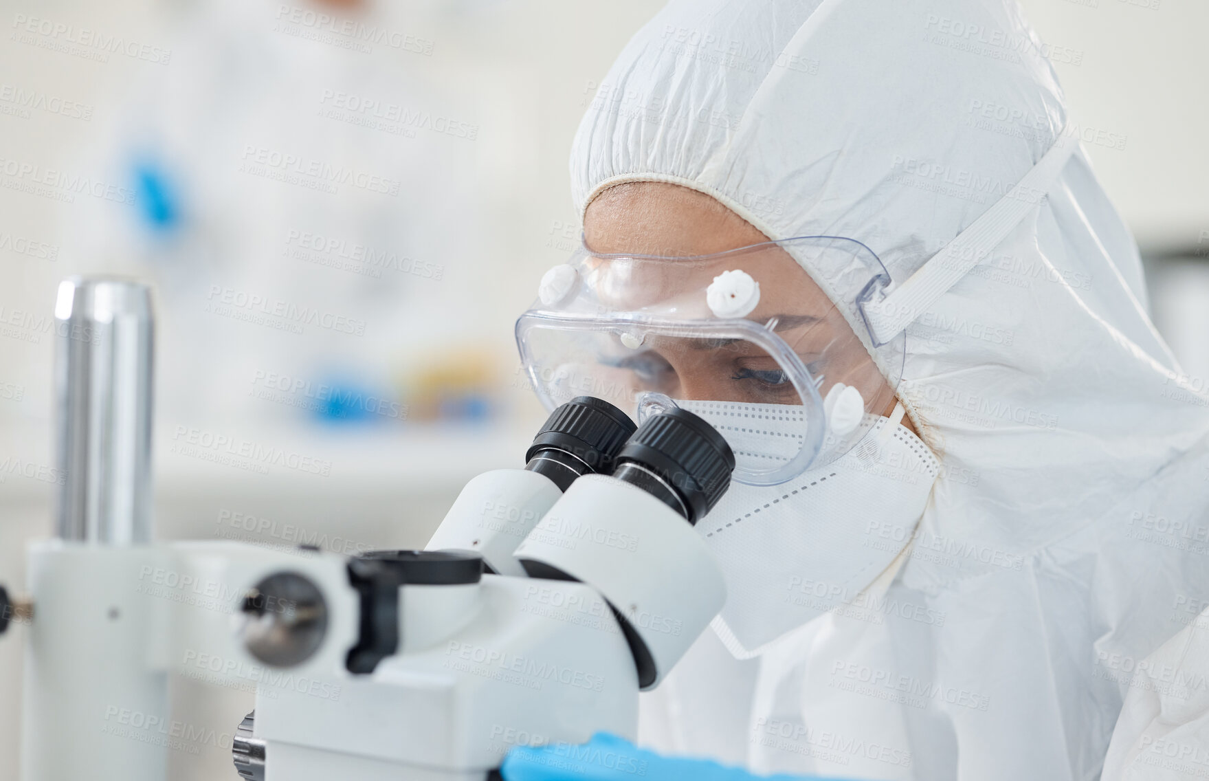 Buy stock photo Microscope, ppe and woman scientist checking virus, test results or pharmaceutical innovation with mask. Safety, gear and lab technician with bacteria research, medical danger or vaccine development