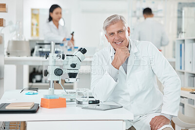 Buy stock photo Smile, portrait and mature man in laboratory with confidence, research and medical science innovation. Healthcare, happy and scientist at desk with notes, study or pride in pharmaceutical engineering