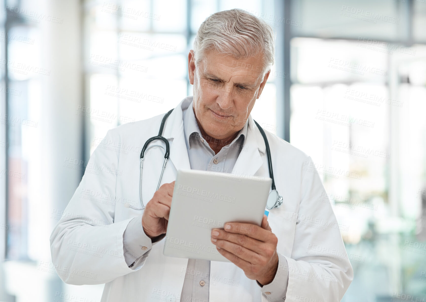 Buy stock photo Healthcare, mature man and doctor with tablet, typing and internet with connection in hospital. Person, medical and professional in clinic, tech and research for diagnosis, online schedule and app