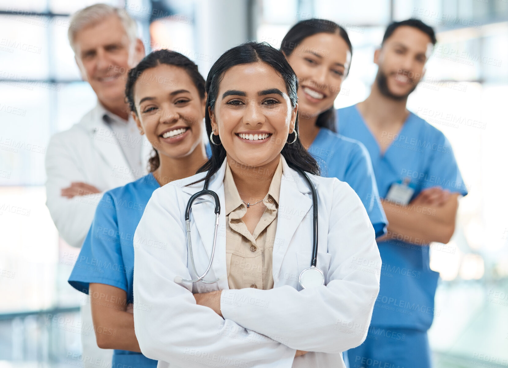 Buy stock photo Portrait, people and doctors with confident in hospital for medical service, collaboration and career pride. Smile, woman and arms crossed with healthcare leadership, about us and treatment of health