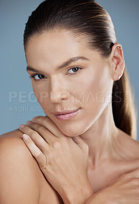 Buy stock photo Skincare, portrait or face of woman in studio for luxury, natural beauty or wellness on blue background. Female person, spa treatment or dermatology for clear skin with salon care, peace or satisfied