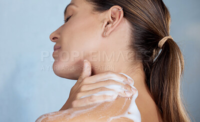 Buy stock photo Shot of a woman washing herself against a grey background