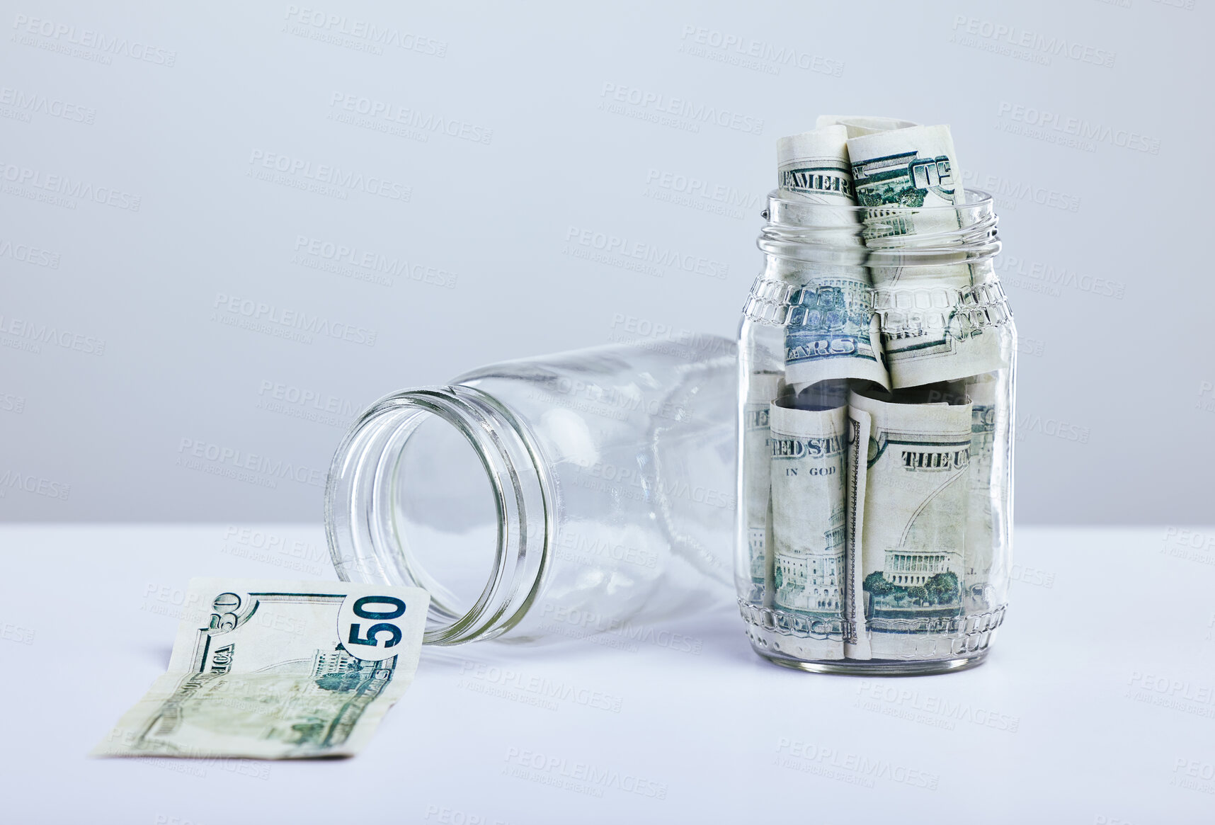 Buy stock photo Container, paper and cash as savings for financial freedom and investment with growth on white background. Glass jar, notes and money as budget for retirement, payment and dollar with finance